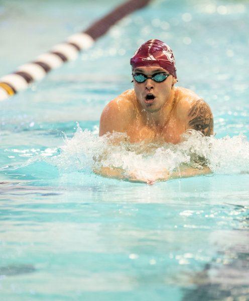 Senior swimmer Vincent Ribeiro performs his breast stroke during Texas A&M's meet against Tennessee on Friday, Oct. 27, 2023 at Rec Center Natatorium (Katelynn Ivy/The Battalion)