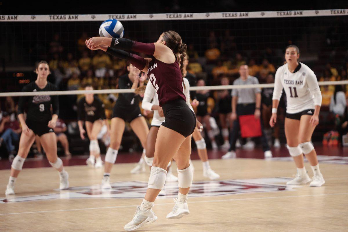 <p>Sophomore L Ava Underewood (12) bumps the ball during Texas A&M's game against Mississippi State on Wednesday, Sept. 20, 2023.</p>