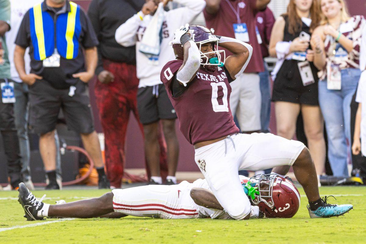 Graduate WR Ainias Smith (0) holds his hands to his head after an incompletion during Texas A&Ms football game against Alabama at Kyle Field on Saturday, Oct. 7, 2023. (Chris Swann/The Battalion)