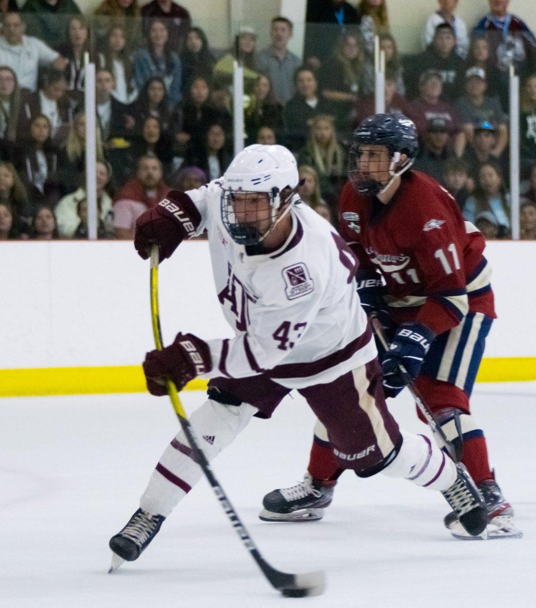 Junior Forward Robby Sours (43) taks a shot during Texas A&Ms game against Metro State Univeristy - Denver on Friday Oct. 13, 2023 at Spirit Ice Arena.
