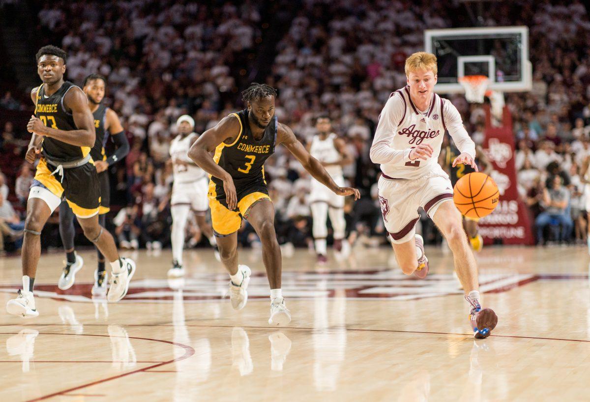 <p>Senior G Hayden Hefner (2) dribbles the ball up the court during Texas A&M's game against A&M Commerce.</p>