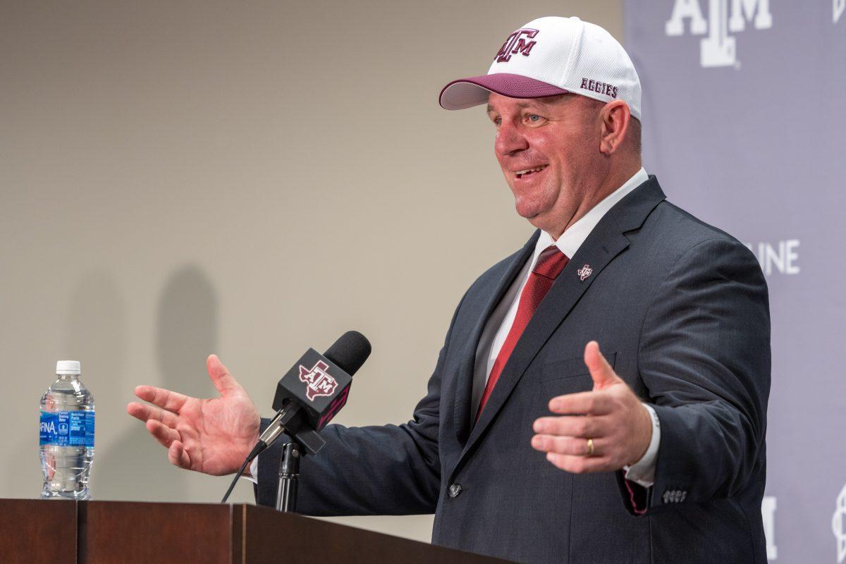 Texas A&M Head Coach Mike Elko speaks to the media at the Kyle Field Hall of Champions on Monday, Nov. 27, 2023. (Chris Swann/The Battalion)