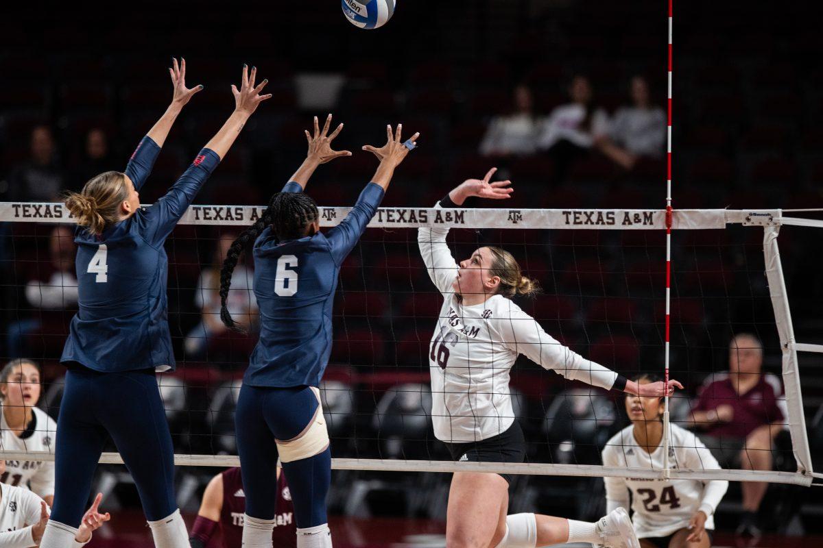 <p>Senior OH Caroline Meuth (16) spikes the ball during Texas A&M's match against Ole Miss on Wednesday, Nov. 22, 2023 at Reed Arena. (Ishika Samant/The Battalion)</p>