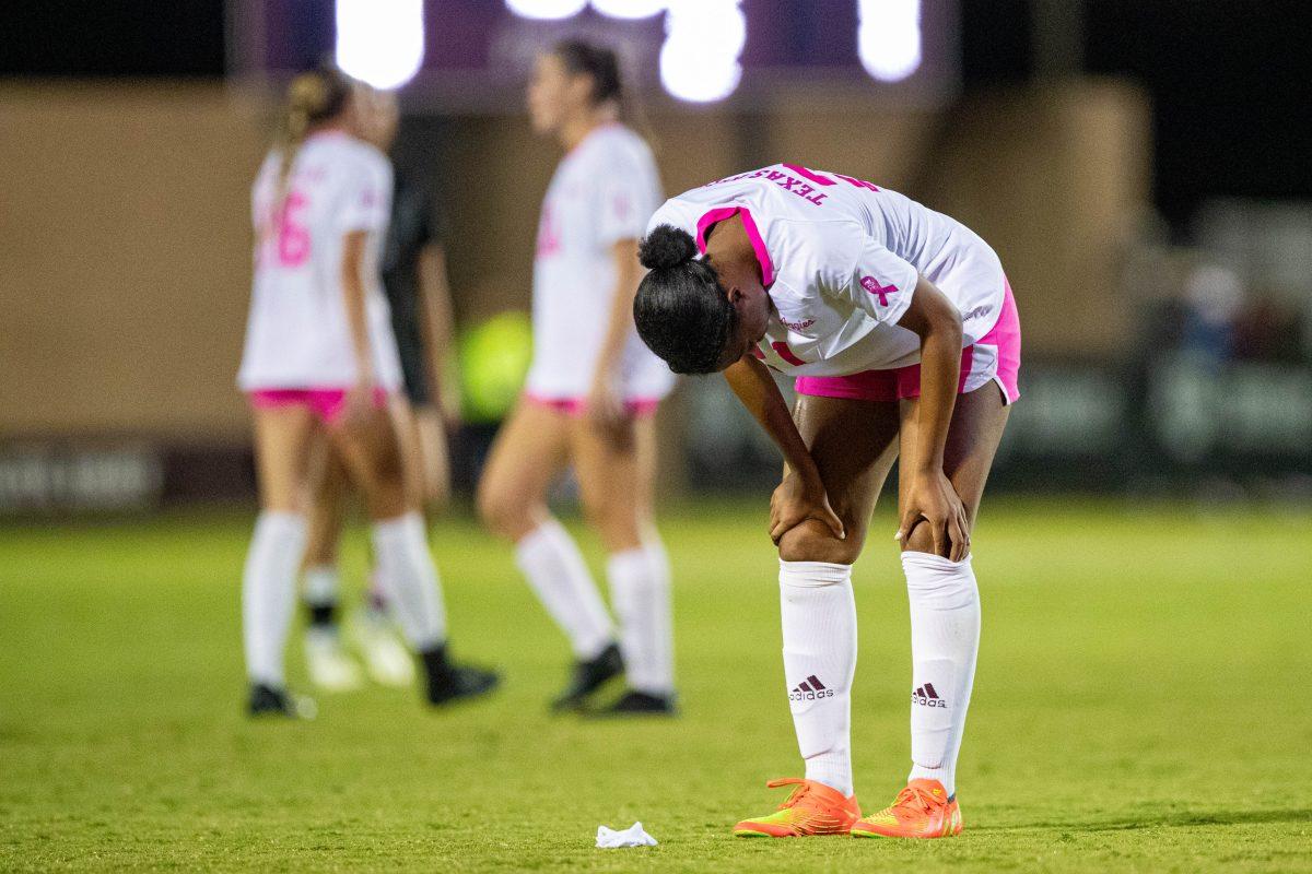 <p>Senior F Jazmine Wilkinson (21) laments as time expires after Texas A&M's game vs. South Carolina at Ellis Field on Thursday, Oct. 19, 2023. (Chris Swann/The Battalion)</p>