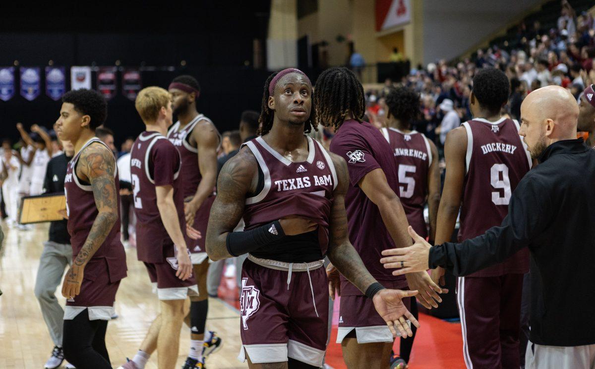 Junior G Manny Obaseki (35) walks to the bench after Texas A&Ms loss against FAU at the ESPN Events Invitational in Kissimmee, Florida on Friday, Nov. 24, 2023.