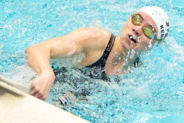 <p>Senior Bobbi Kennett surfaces while swimming in the Women 200 LC Meter IM during the 2023 Art Adamson Invitational at the Texas A&M Natatorium on Wednesday, Nov. 15, 2023. (CJ Smith/The Battalion)</p>