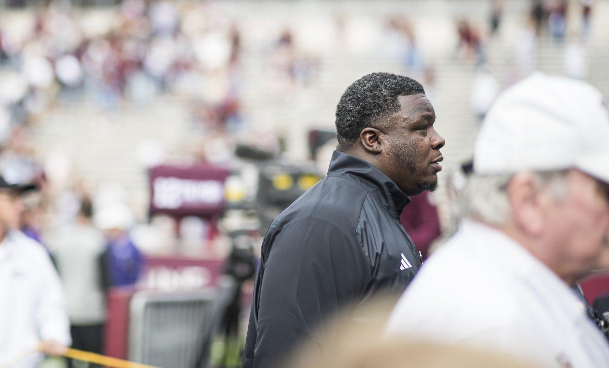 Texas A&M interim head coach Elijah Robinson walks out of his first win 38-10 during Texas A&Ms game against ACU on Saturday, Nov. 18, 2023 at Kyle Field. (Ishika Samant/The Battalion)