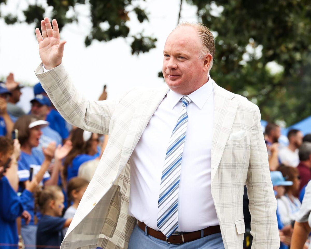 Kentucky head coach Mark Stoops waves to fans at the Cat Walk before the Kentucky vs. Eastern Kentucky football game on Saturday, Sept. 9, 2023, at Kroger Field in Lexington, Kentucky.&#160;