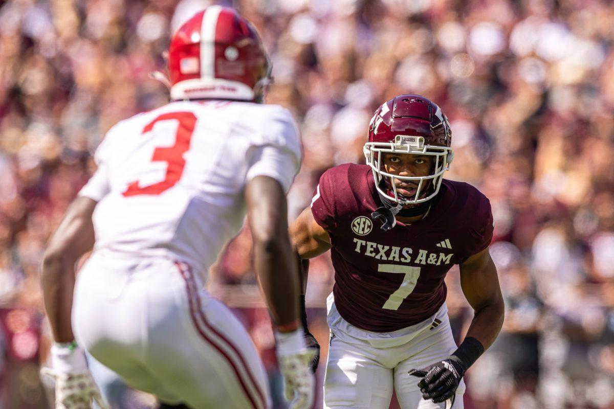 Junior WR Moose Muhammad III (7) looks toward an Alabama defender during Texas A&Ms football game against Alabama at Kyle Field on Saturday, Oct. 7, 2023. (Chris Swann/The Battalion)