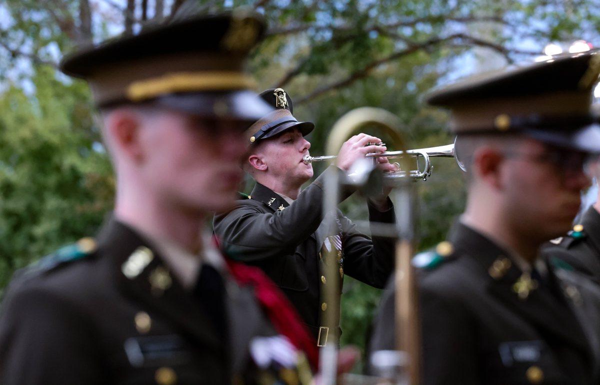 <p>The fightin' Texas Aggie Band Bugler closes the 2023 Brazos Valley Veterans Memorial Veterans Day Ceremony with taps on Sunday, Nov. 12 at Veterans Park. (Bridget Bristow/The Battalion)</p>