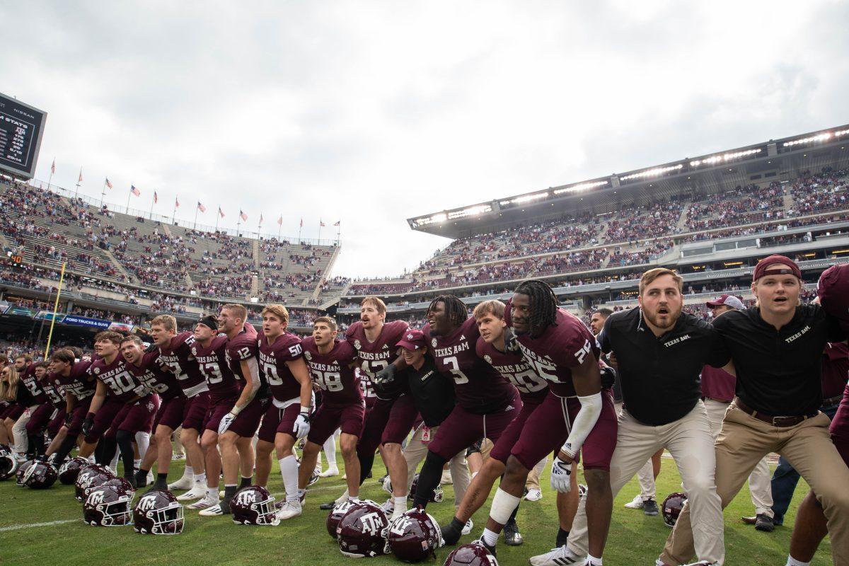 The+Texas+A%26amp%3BM+football+team+sways+to+the+war+hymn+after+their+last+game+of+the+season+against+ACU+on+Nov.+18%2C+2023+at+Kyle+Field.