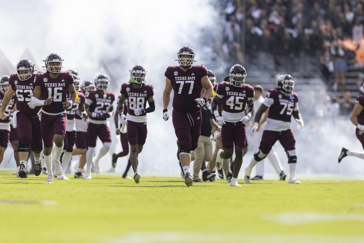 Freshman OL Colton Thommason (77) runs out during Texas A&amp;M's game against ACU on Saturday, Nov. 18, 2023 at Kyle Field. (Ishika Samant/The Battalion)