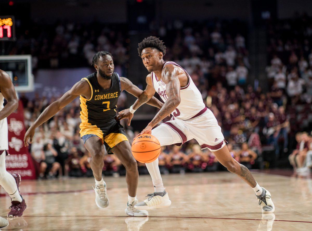 Graduate G Eli Lawrence (5) dribbles the ball during Texas A&Ms game vs. A&M-Commerce on Monday, Nov. 6, 2023 at Reed Arena. (Ishika Samant/The Battalion)