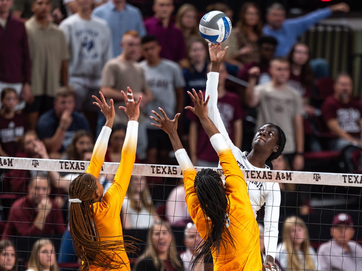 Freshman OPP Ital Lopuyo (2) spikes the ball during Texas A&amp;M's Game against Tennessee at Reed Arena on Sunday, Nov. 19, 2023. (Chris Swann/The Battalion)