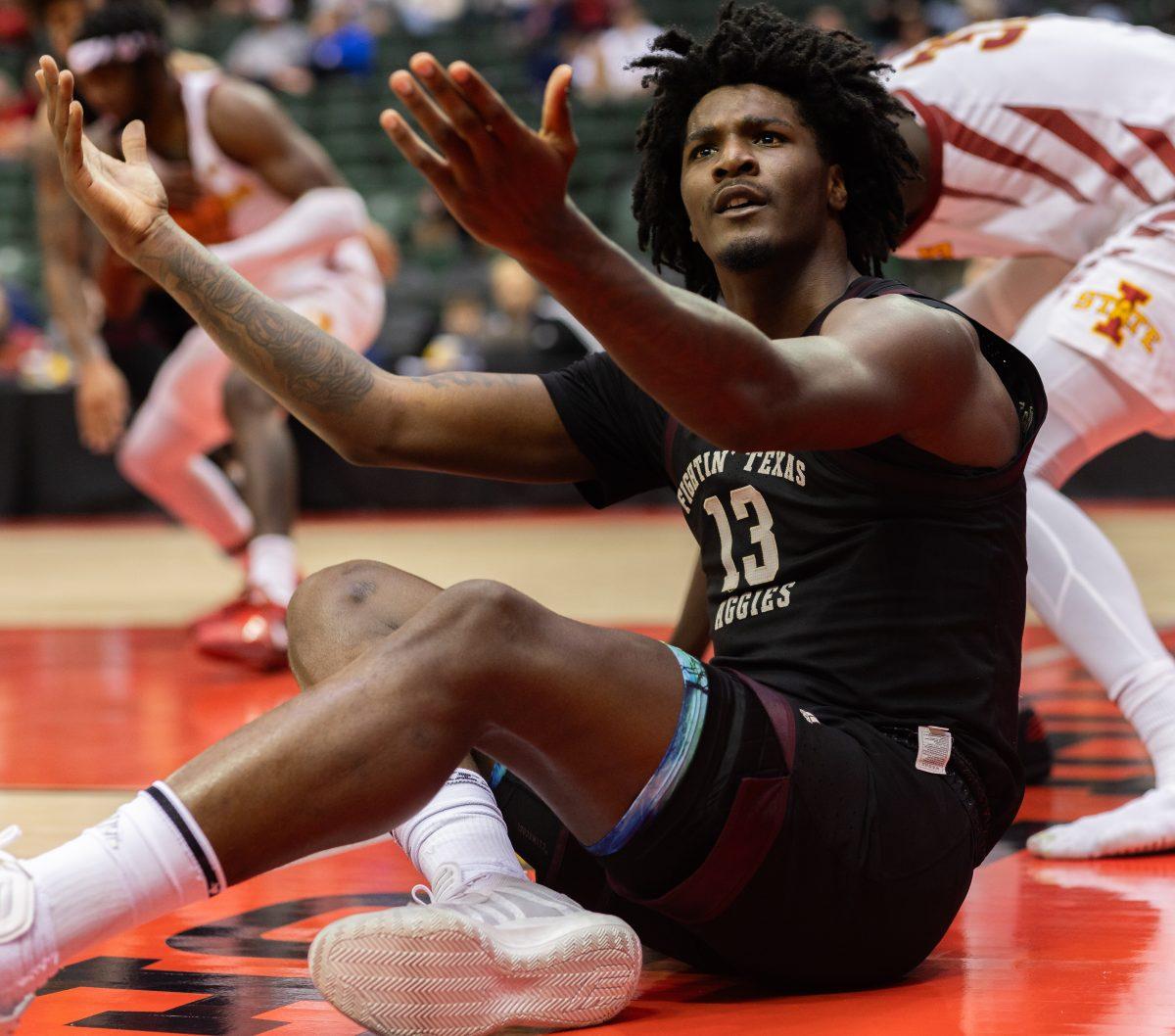 Sophomore F Solomon Washington (13) reacts to the referee after a no-call during Texas A&amp;M's game against Iowa State at the ESPN Events Invitational in Kissimmee, Florida on Sunday, Nov. 26, 2023.