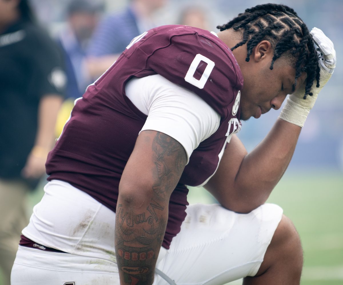 Sophomore DL Walter Nolen (0) mourns the loss against the Tigers during Texas A&amp;M's game against LSU on Saturday, Nov. 25, 2023 at Tiger Stadium. (Katelynn Ivy/The Battalion)