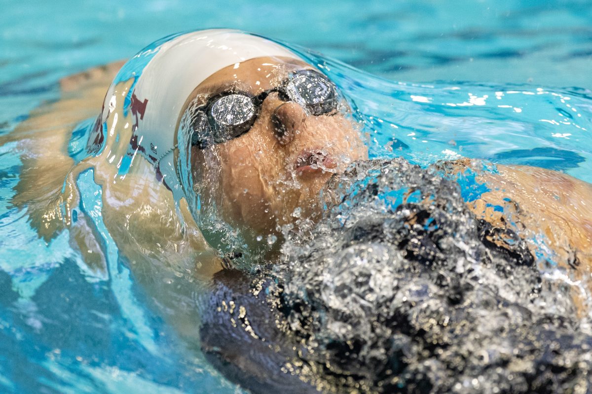 <p>Senior swimmer Charlotte Longbottom surfaces during the Women's 200 LC Meter IM at the 2023 Art Adamson Invitational at the Texas A&M Natatorium on Wednesday, Nov. 15, 2023. (Chris Swann/The Battalion)</p>