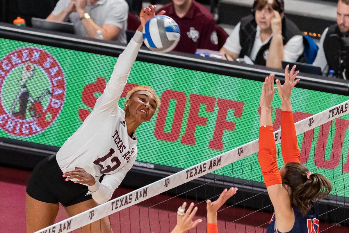 Freshman+OH+Bianna+Muoneke+%2813%29+spikes+the+ball+during+Texas+A%26amp%3BMs+game+vs.+Auburn+at+Reed+Arena+on+Sunday%2C+Nov.+5%2C+2023.+%28Chris+Swann%2FThe+Battalion%29