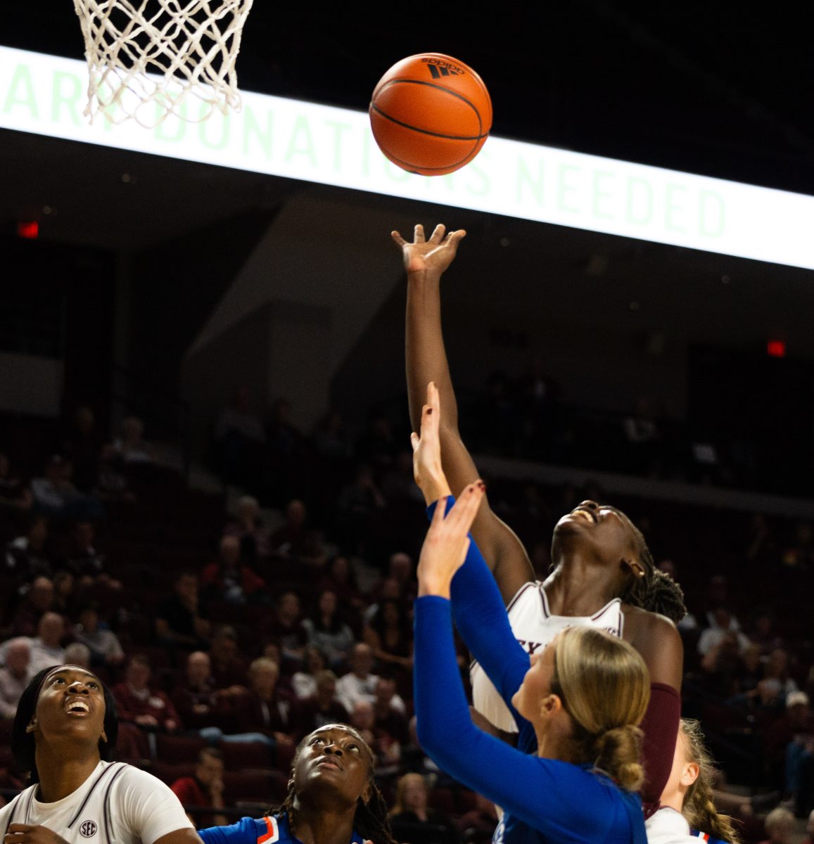 <p>Senior G Aicha Coulibaly (5) jumps for the shot during Texas A&M's game against HCU at Reed Arena on Monday, Nov. 20, 2023.</p>