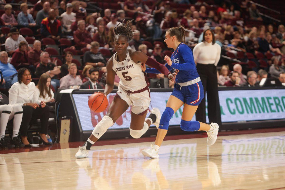 Senior+G+Aicha+Coulibaly+%285%29+attempts+to+get+around+her+opponent+during+Texas+A%26amp%3BMs+womens+basketball+game+against+HCU+on+Nov.+20%2C+2023+at+Reed+Arena.