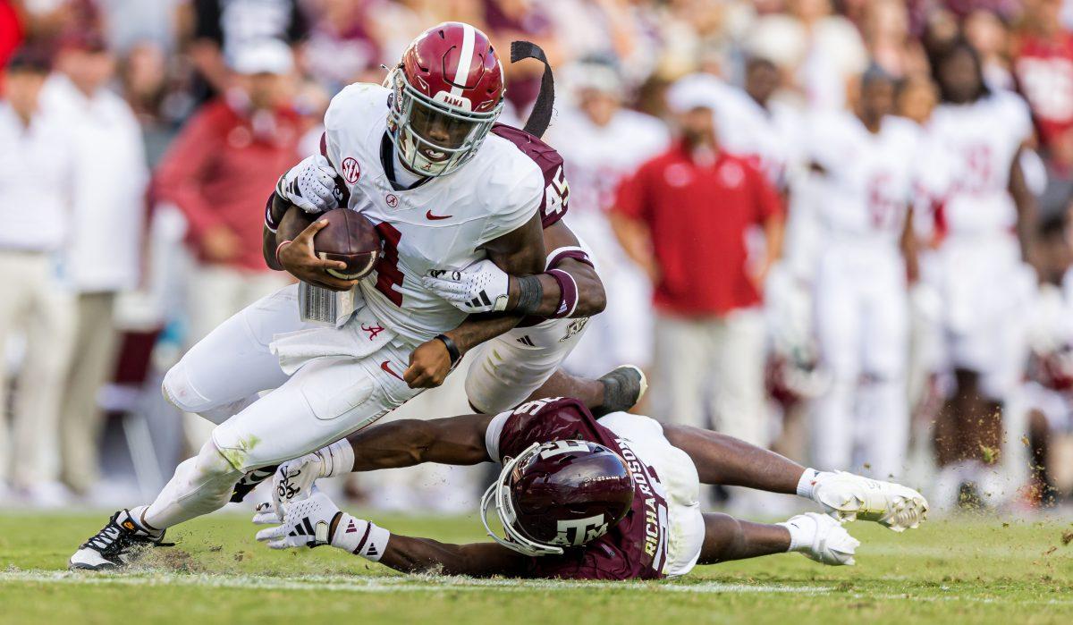 <p>Senior DB Demani Richardson (26) brings down Alabama QB Jalen Milroe (4) during Texas A&M's game against Alabama on Saturday, Oct. 7, 2023. (Ishika Samant/The Battalion)</p>