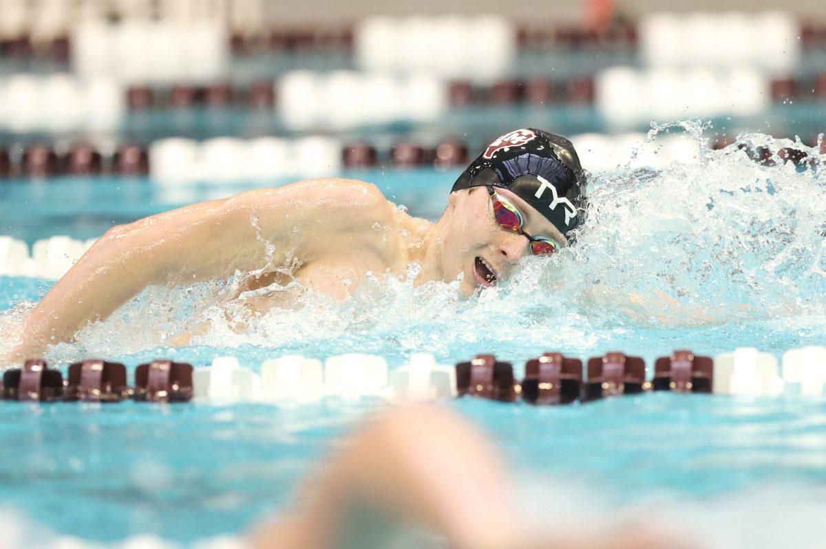 <p>Junior Trey Dickey swims in the Men 500 LC Meter Freestyle during the 2023 Art Adamson Invitational at the Texas A&M Natatorium on Wednesday, Nov. 15, 2023. (CJ Smith/The Battalion)</p>