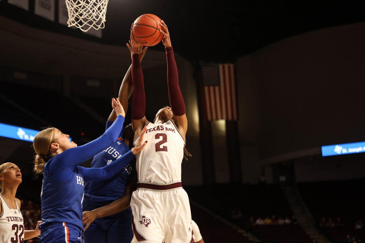 <p>Sophomore F Janiah Barker (2) grabs a rebound during Texas A&M's women's basketball game against HCU on Nov. 20, 2023 at Reed Arena.</p>