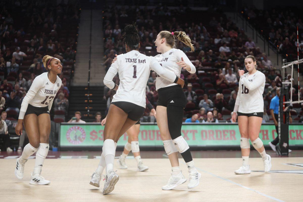 Sophomore MB Ifenna Cos-Okpalla (1), Freshman S Margot Manning (10), and Freshman OH Bianna Muoneke (13) celebrate after a play during Texas A&Ms game against Alabama at Reed Arena on Friday, Nov. 3, 2023.