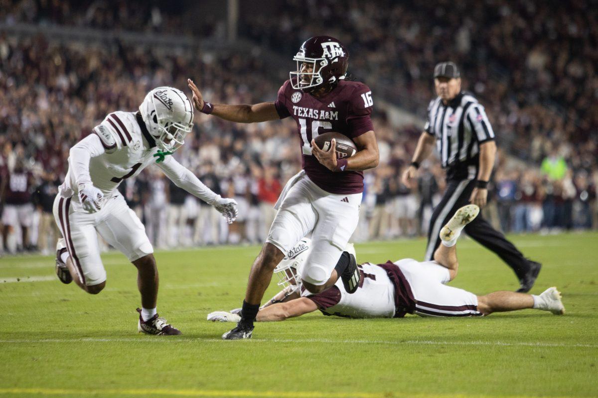 Sophomore QB Jaylen Henderson (16) runs the ball in for a touchdown in Texas A&Ms game against Mississippi state on Saturday, Nov. 11, 2023 at Kyle Field. (Julianne Shivers/ The Battalion)