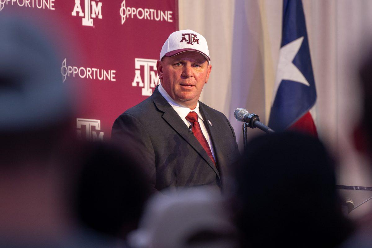 Texas A&M Head Coach Mike Elko speaks to the audience for the first time since his hiring at the Kyle Field Hall of Champions on Monday, Nov. 27, 2023. (Chris Swann/The Battalion)