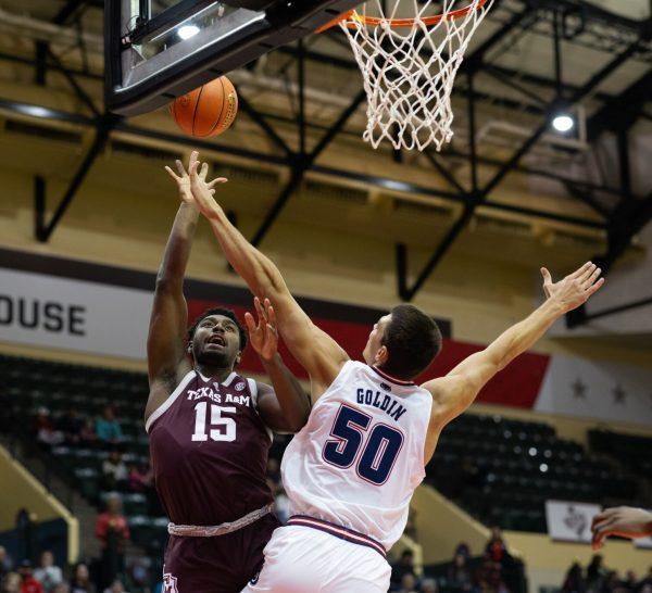 Senior F Henry Coleman III (15) puts up a shot during Texas A&M's game against FAU at the ESPN Events Invitational in Kissimmee, Florida on Friday, Nov. 24, 2023.