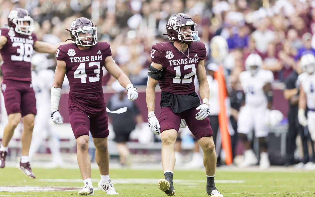Graduate DB Sam Mathews (12) celebrates after a tackle during Texas A&Ms game against ACU on Saturday, Nov. 18, 2023 at Kyle Field. (Ishika Samant/The Battalion)
