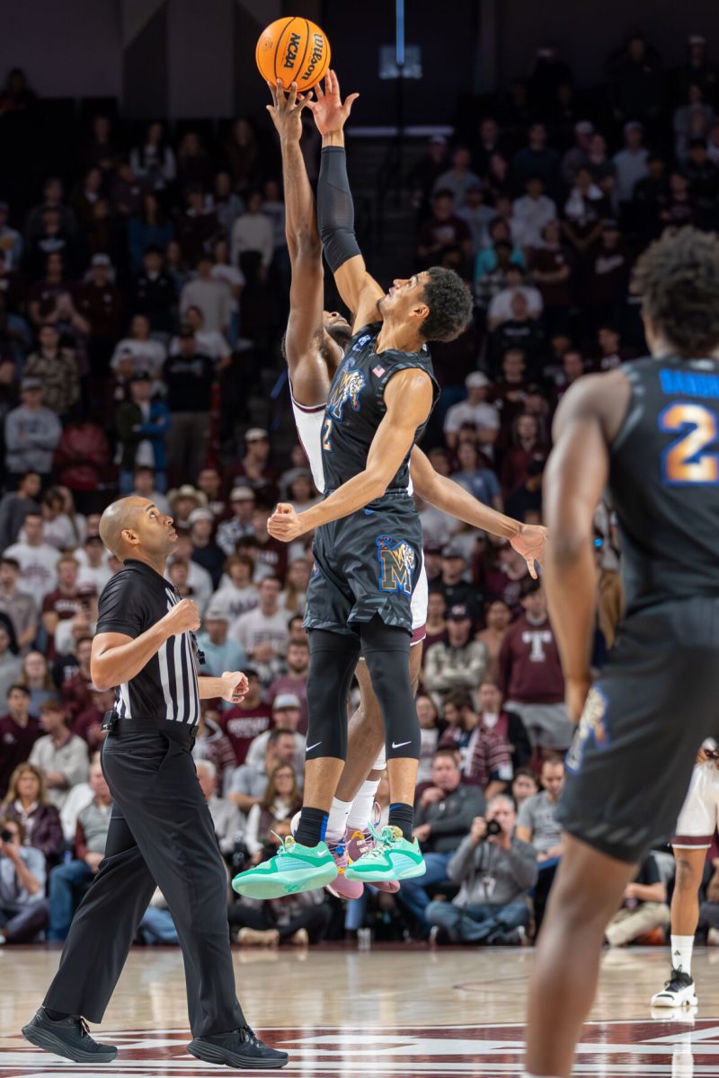 Graduate F/C Wildens Leveque (10) competes with Memphis F Nicholas Jourdain (2) for the jump ball during Texas A&Ms game against Memphis on Sunday, Dec. 10, 2023 at Reed Arena. (CJ Smith/The Battalion)
