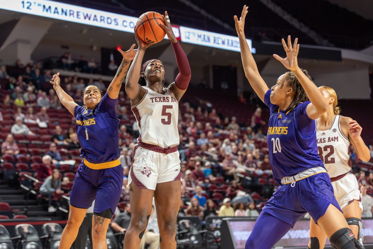 <p>Senior G Aicha Coulibaly (5) makes a layup during A&M's game against Prairie View on Wednesday, Dec. 20, 2023 at Reed Arena. (CJ Smith/The Battalion)</p>
