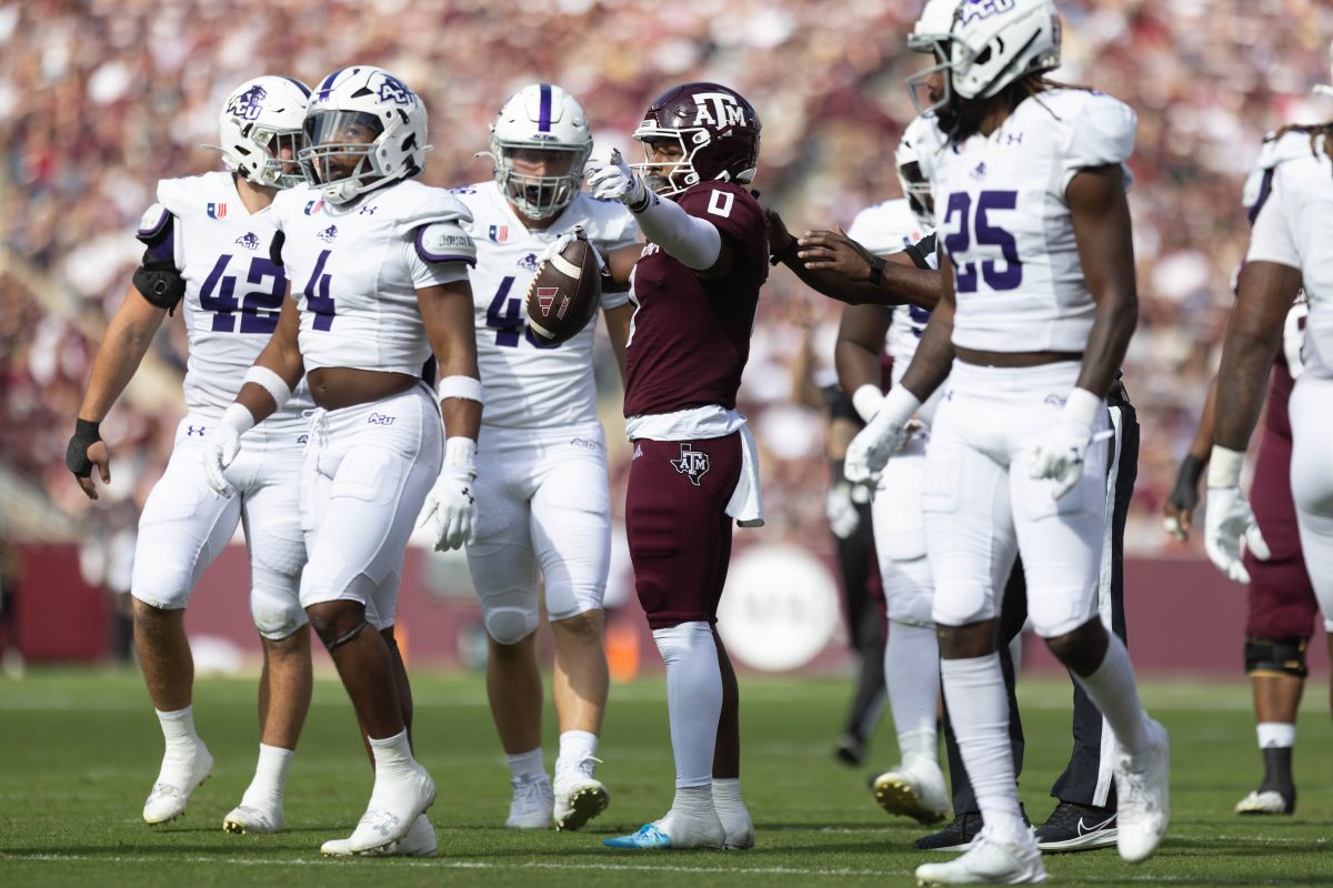 Graduate WR Ainias Smith (0) points after a first down in Texas A&Ms game against ACU on Saturday, Nov. 18, 2023 at Kyle Field. (Julianne Shivers/ The Battalion)