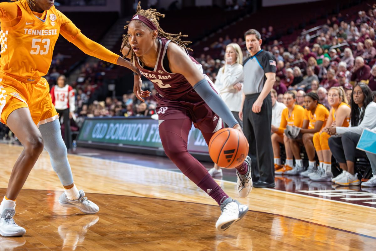 Sophomore F Janiah Barker (2) drives past a defender during A&Ms game against Tennessee on Sunday, Jan. 14, 2024 at Reed Arena. (CJ Smith/The Battalion)