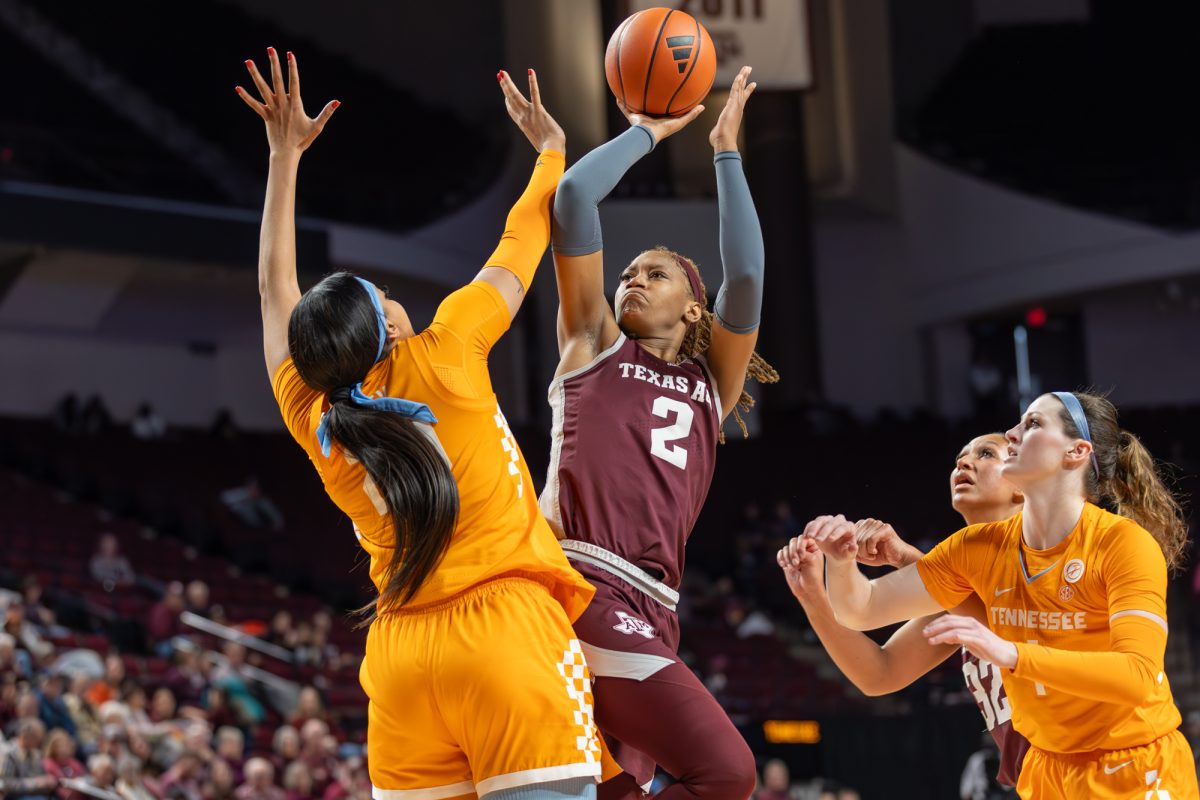 Sophomore F Janiah Barker (2) takes a contested jump shot during A&Ms game against Tennessee on Sunday, Jan. 14, 2024 at Reed Arena. (CJ Smith/The Battalion)