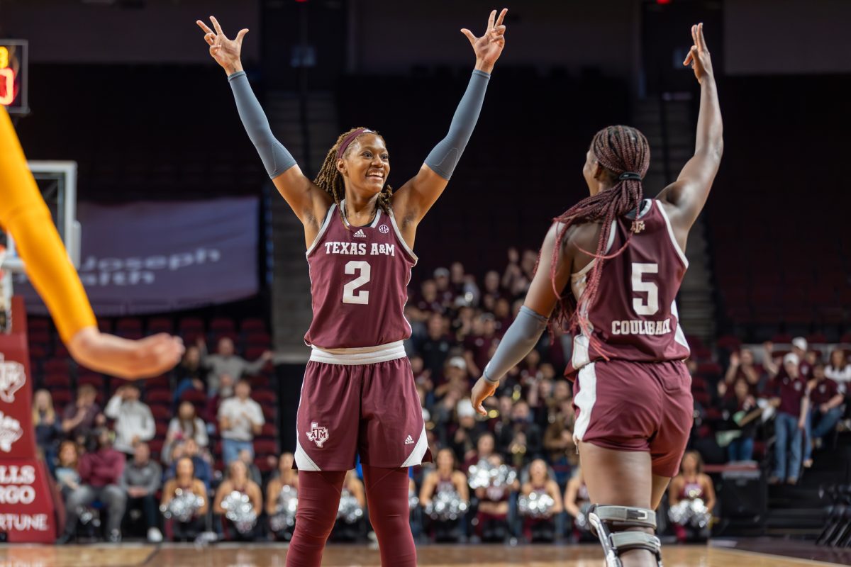 Sophomore F Janiah Barker (2) and Senior G Aicha Coulibaly (5) celebrate after a made three during A&M's game against Tennessee on Sunday, Jan. 14, 2024 at Reed Arena. (CJ Smith/The Battalion)