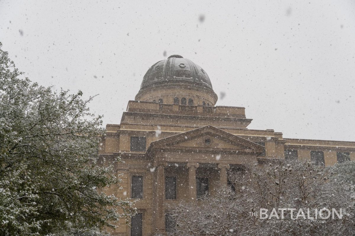 The Academic Building covered in snow on Jan. 10, 2021. (Will Nye/The Battalion)