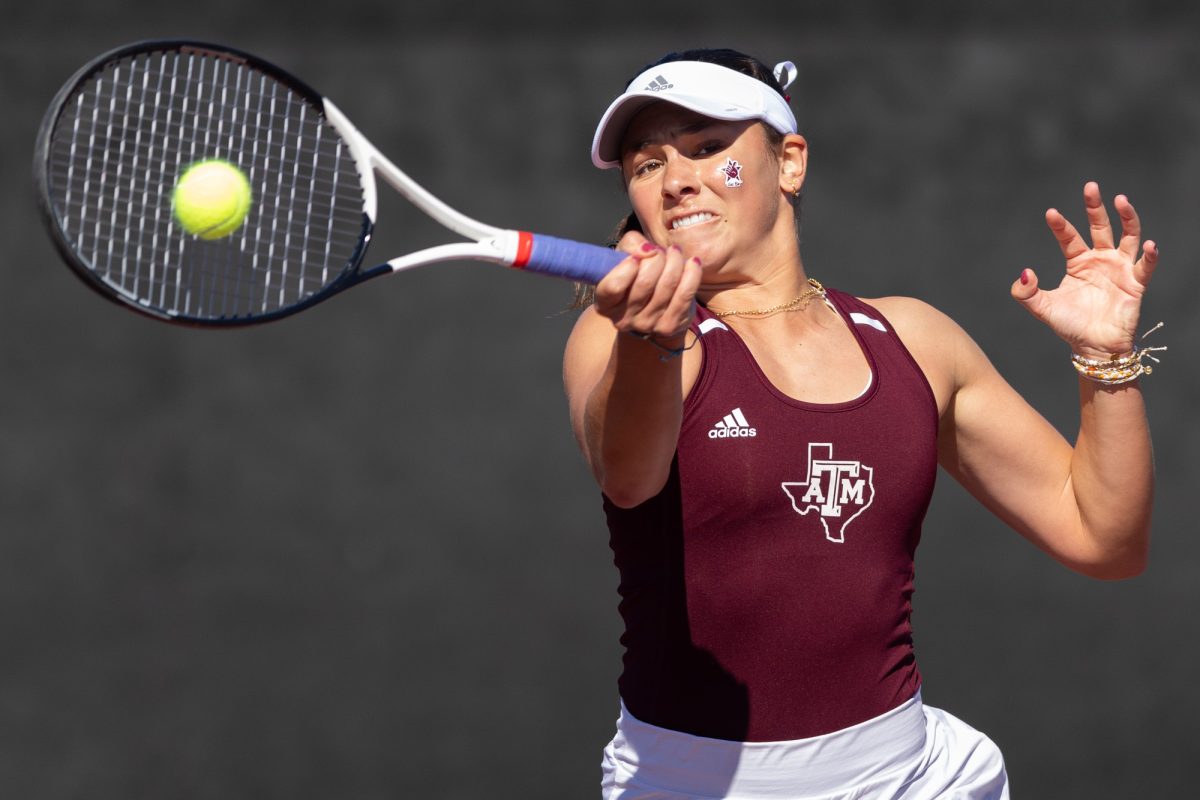 Sophomore Mia Kupres hits during Texas A&Ms match against TCU on Sunday, Jan. 28, 2024 at Mitchell Outdoor Tennis Center. (Chris Swann/The Battalion)