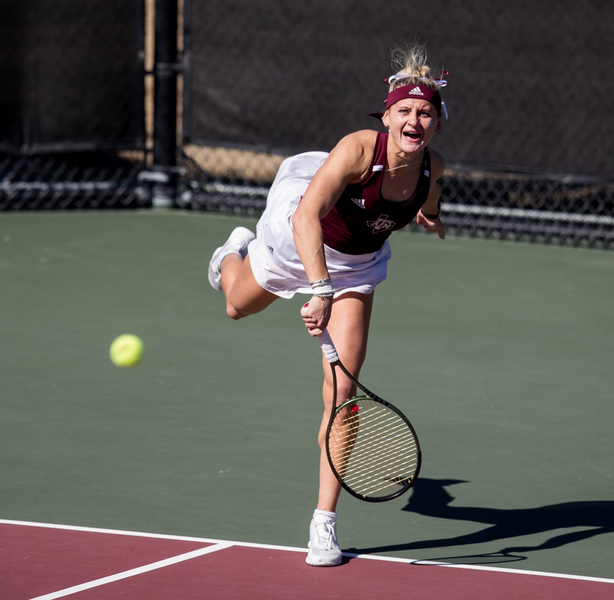 Sophomore Daria Smetannikov hits during Texas A&Ms match against TCU on Sunday, Jan. 28, 2024, at Mitchell Outdoor Tennis Center. (Connor May/The Battalion)