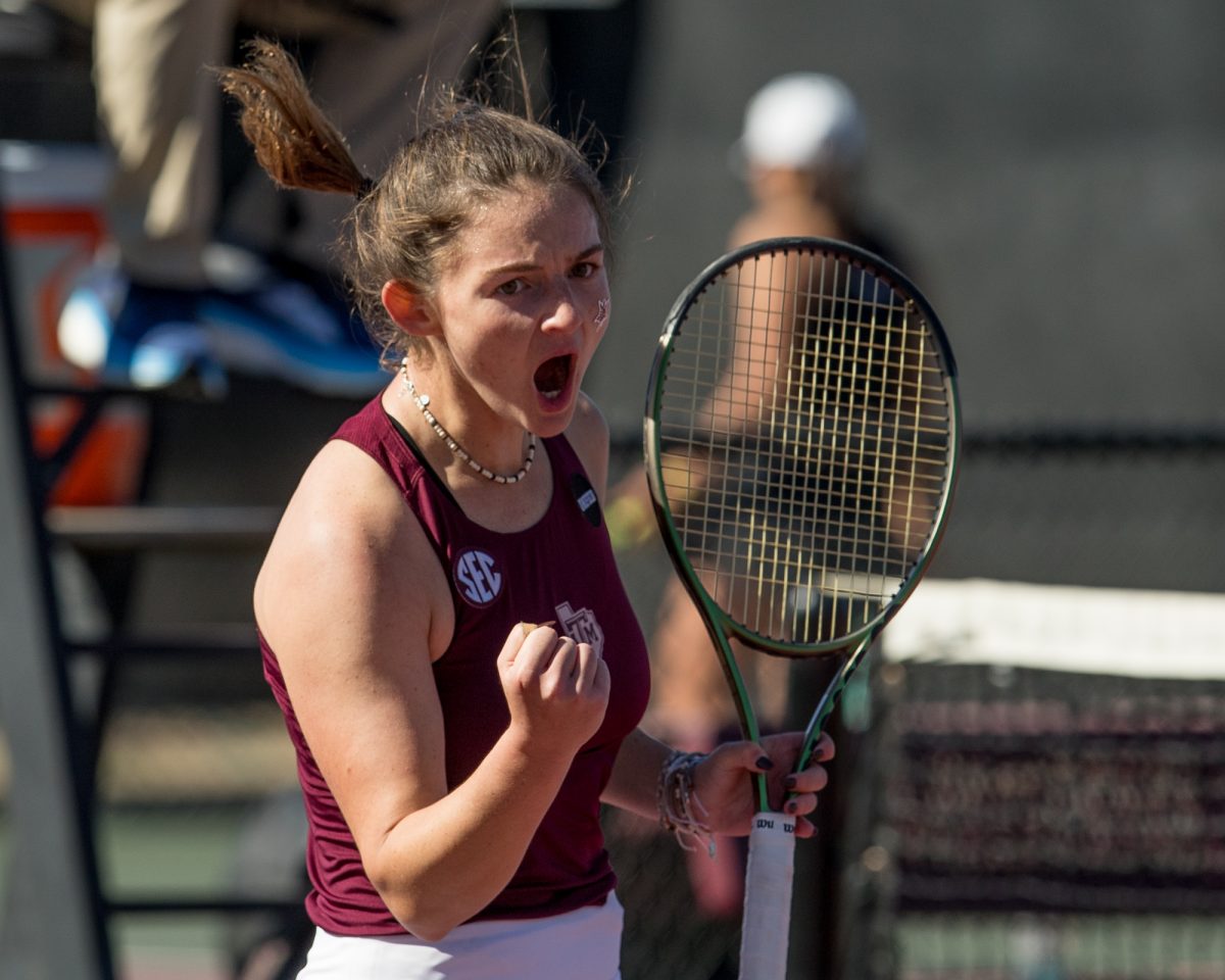 Sophomore Nicole Khirin reacts after scoring a point during Texas A&Ms match against TCU on Sunday, Jan. 28, 2024, at the Mitchell Tennis Center. (Connor May/The Battalion)