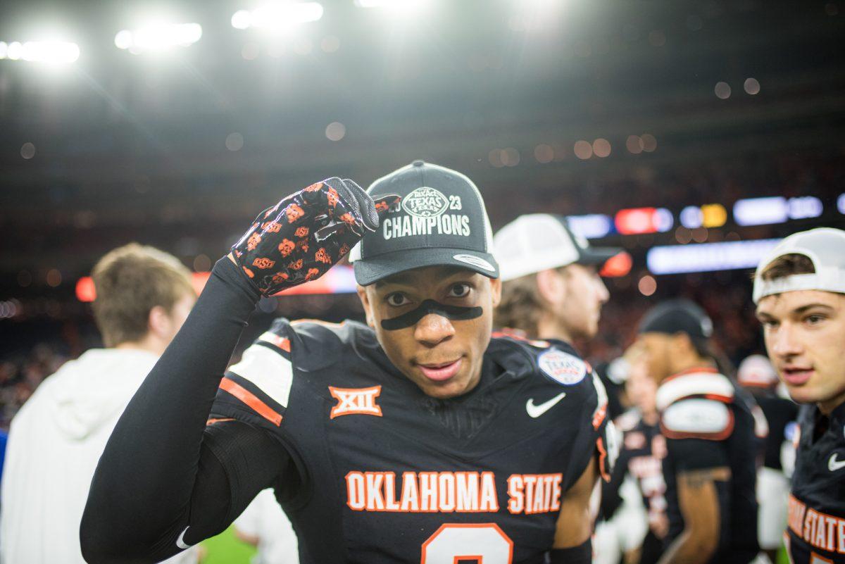 Oklahoma State RB Ollie Gordon (0) shows his hat during the Texas Bowl against Oklahoma State on Wednesday, Dec. 27, 2023 at NRG Statdium in Houston, Texas. (Ishika Samant/The Battalion)