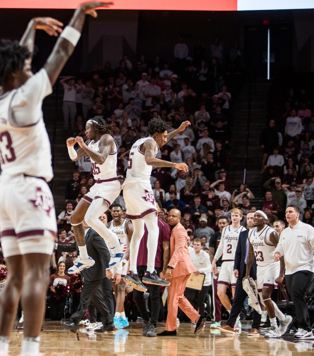 Junior G Manny Obaseki (35) celebrates with graduate G Eli Lawrence (5) during Texas A&M's game against Kentucky on Saturday, Jan. 13, 2024 at Reed Arena.(Ishka Samant/The Battalion)