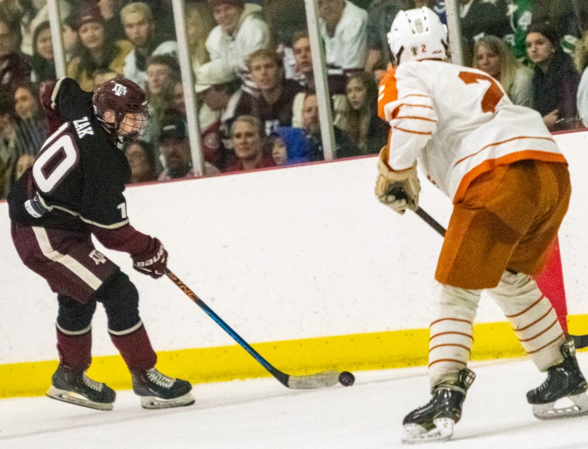 Freshman Forward Colson Zak (1) advances the puck during Texas A&amp;M's game against Texas on Saturday, Jan. 27, 2024 at Spirit Ice Arena.