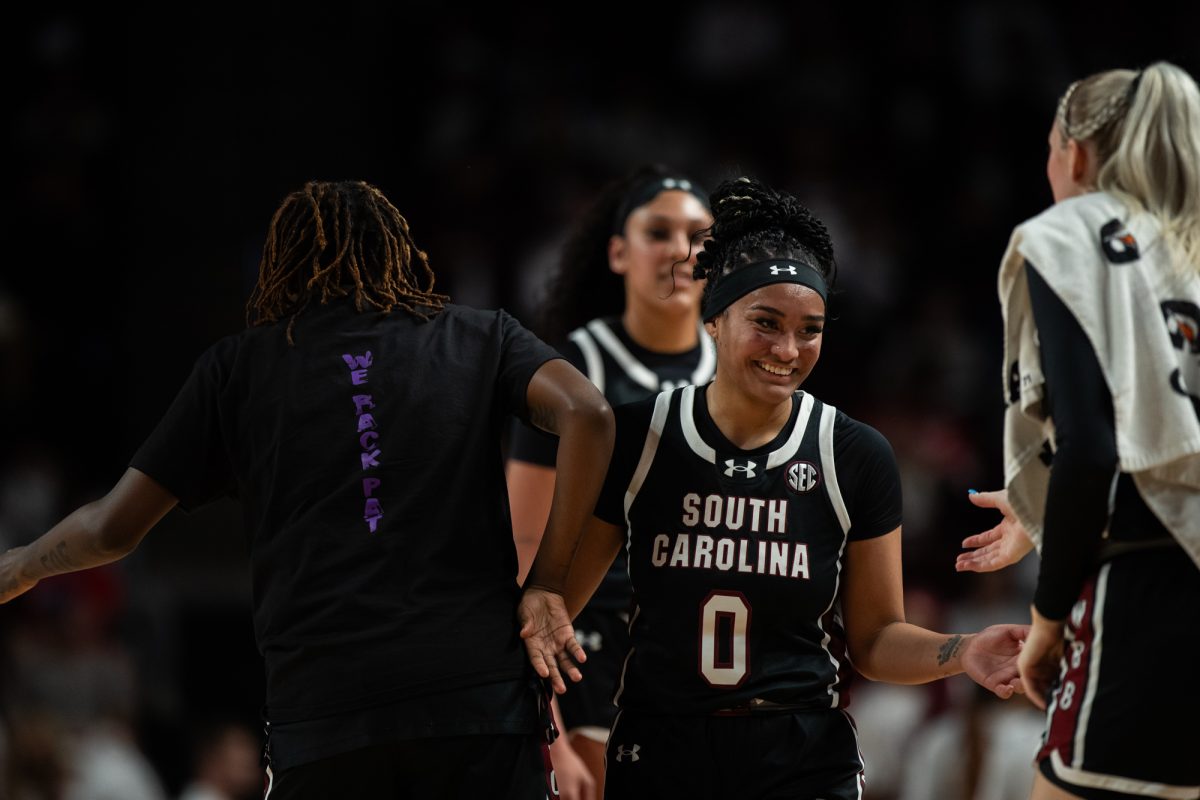 South Carolina guard Te-Hina Paopao (0) high fives her teammates during Texas A&amp;M’s game against South Carolina on Saturday, Jan. 6, 2024, in Reed Arena. (Ishika Samant/The Battalion)