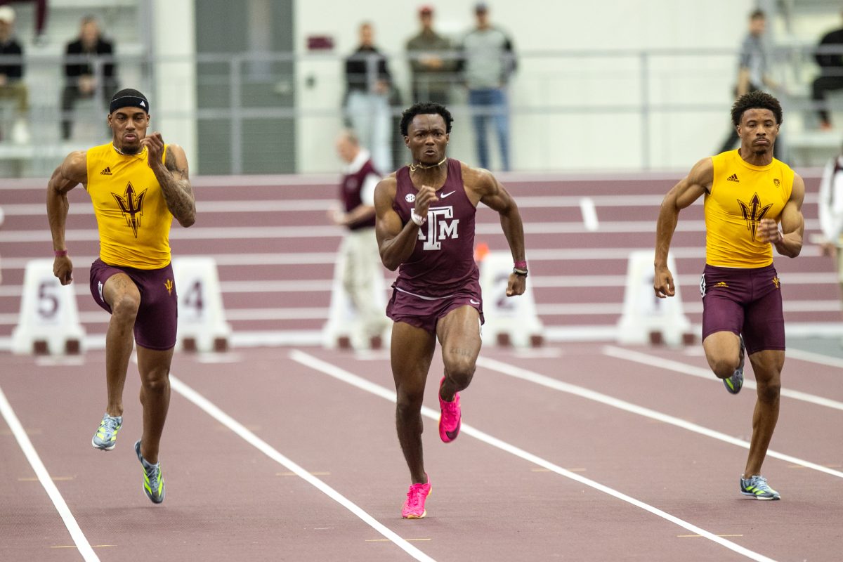 Texas A&amp;M junior Devante Mount runs the mens 60m prelims during the Ted Nelson Invitional at the Murray Fasken Indoor Track on Jan. 20, 2024. (Mattie Taylor/The Battalion)