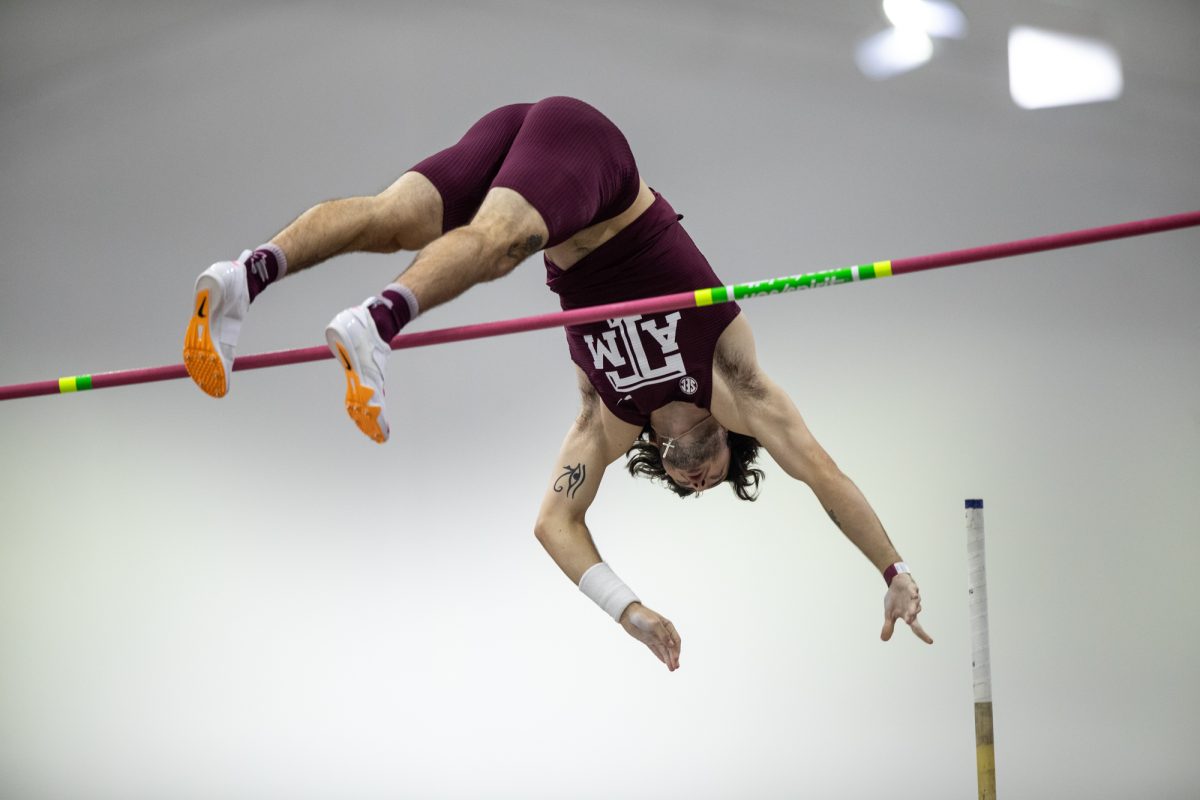 Texas A&M senior Connor Gregston clears the bar during the Ted Nelson Invitional at the Murray Fasken Indoor Track on Jan. 20, 2024. (Mattie Taylor/The Battalion)