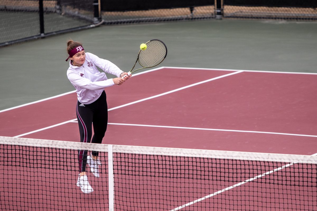 Sophomore Nicole Khirin hits during Texas A&Ms doubles match against Northwestern at Mitchell Outdoor Tennis Center on Saturday, Jan. 27, 2024. (Mattie Taylor/The Battalion)