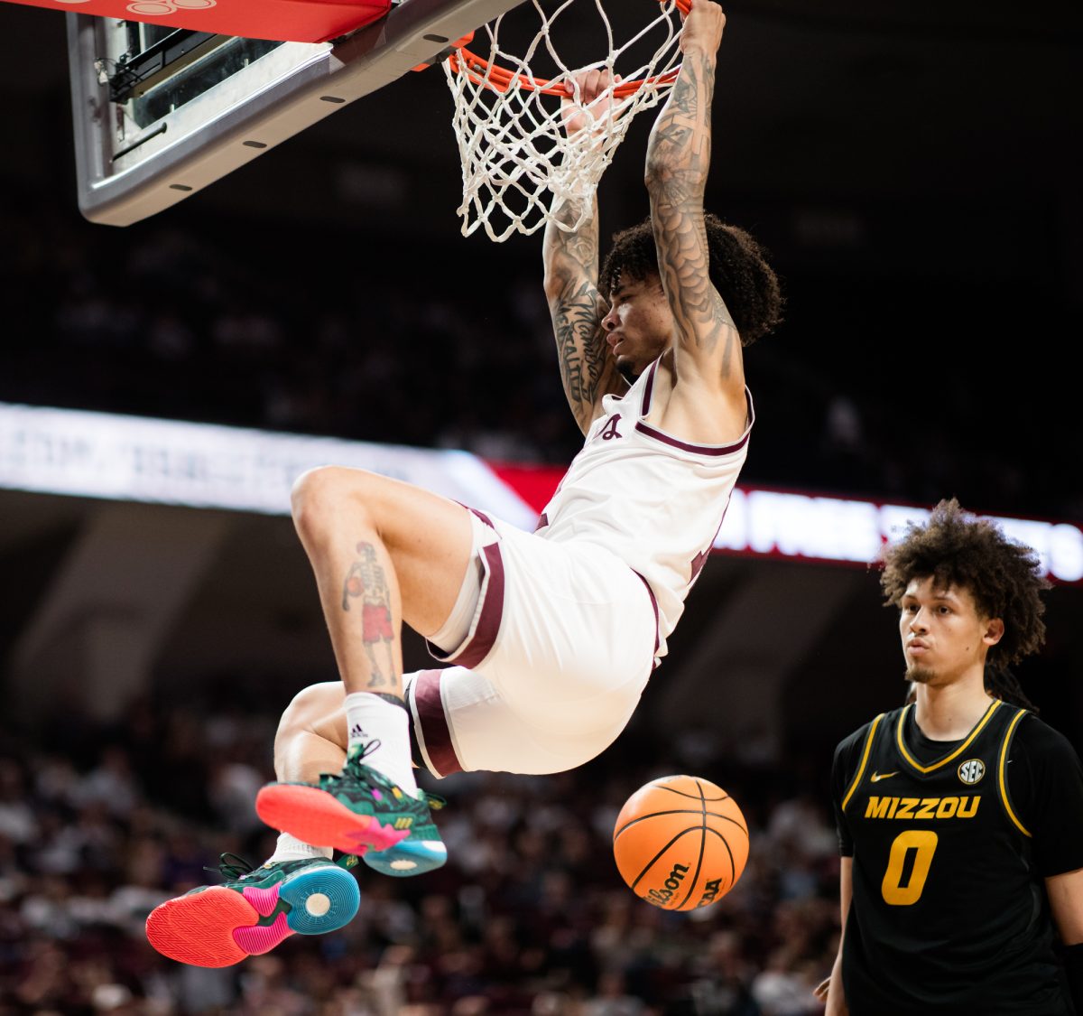 Texas A&M forward Andersson Garcia (11) dunks the ball during Texas A&M’s game against Missouri on Saturday, Jan. 23, 2024, in Reed Arena. (Ishika Samant/The Battalion)